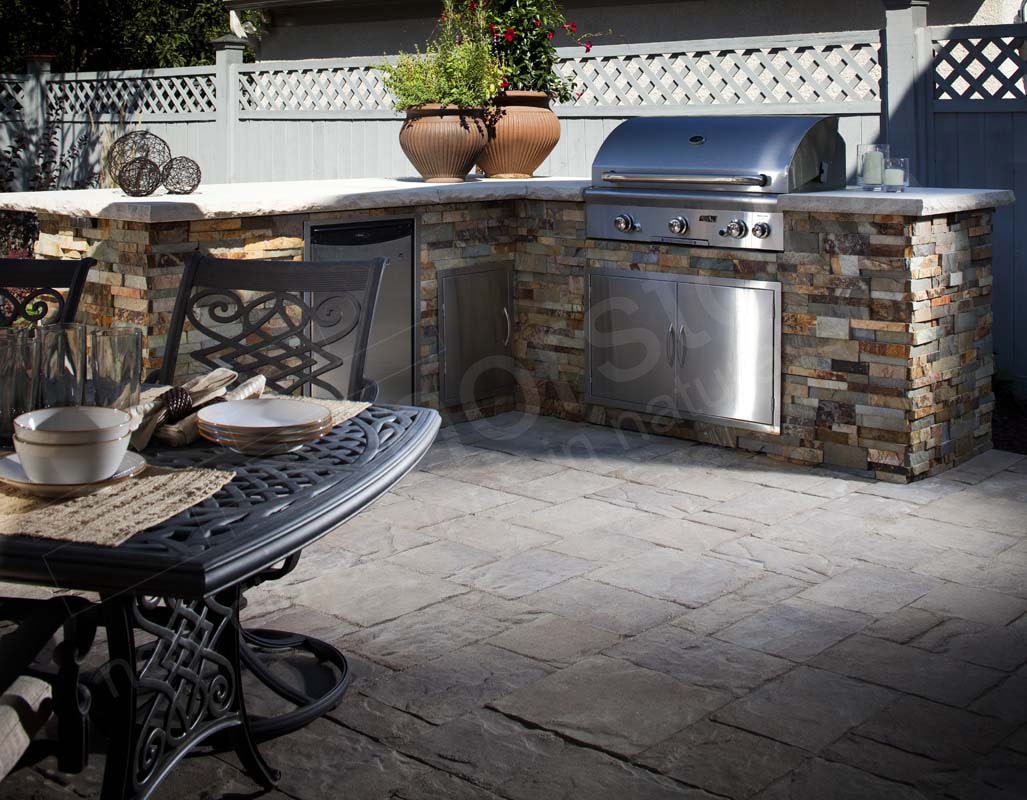 Stacked Stone Veneer installed on a prefab outdoor kitchen with metal substrate